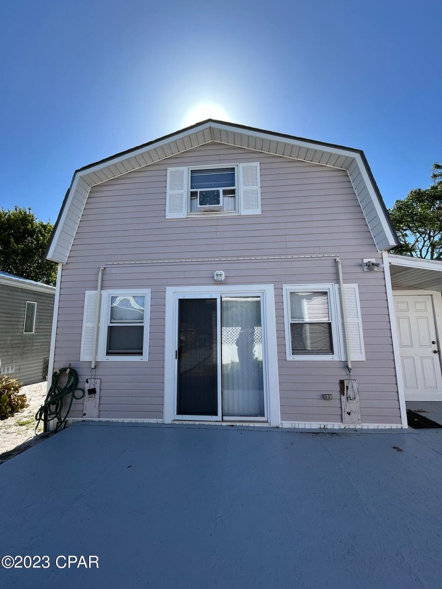 Cozy beach rental located south of Hwy. 98 making it an easy walk or bike ride to catch those beach sunsets. Located in a quiet residential area, this guest home sits on the back of the lot with owners living in the front residence. Downstairs is a kitchen, bathroom and small sitting area, with a spiral staircase taking you upstairs to an open bedroom. Home is very clean, and well suited for one person. Tenant pays for internet and cable, all other utilities included. Sorry, NO PETS AND NONSMOKER ONLY PLEASE.