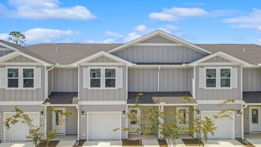 Welcome to Jake's Landing townhomes. This interior unit located at 1794 Jakes Drive offers 3 bedrooms and 2.5 bathrooms and a single car garage. On the outside of these units, you will see quality Color-Plus Hardie Board exteriors, complemented by prairie-style doors and dimensional shingles with a 30-year warranty. Convenience meets security with steel garage doors equipped with openers, weatherproof outlets, hose bibs, and a fully sodded yard where cleared. As you enter inside, you will feel right at home with beautiful EVP flooring at your feet, leading you to the open living room and kitchen or the spacious upstairs. In the kitchen and bathroom, you will find gorgeous granite countertops, white cabinets with brushed nickel hardware, and a full stainless steel appliance package including a stove, microwave, dishwasher refrigerator, washer and dryer. Stay cool with energy-efficient cooling and heating systems, Low-E insulated windows with screens, and ceiling fans in the living room and primary bedroom as well as blinds installed throughout the home. Each home comes with modern Smart Home technology including a Skybell doorbell, Honeywell thermostat, and Smart Switches. An additional convenience is that landscaping and lawn maintenance is included. Rest assured with a one-year builder's warranty from DR Horton and a ten-year structural warranty through RWC. Located in the lovely city of Lynn Haven, Florida, you are not far from great food, shopping, schools, hospitals, and more. These homes offer easy access to Tyndall Air Force Base (just a 20-minute drive) and the world-famous white beaches of Panama City Beach (20 minutes away).