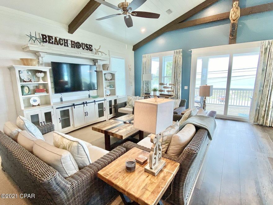 Here's your chance to own custom-built, coastal luxury! As you open the door, you see the owner spared no expense in building this one-of-a-kind beach house. With five master bedroom suites and a sixth custom-built bunk room, you will have plenty of space to maximize your vacation rental potential. Each bedroom is not only beautifully decorated but also contains a private bathroom.  The open layout on the second floor greets you with spectacular, unobstructed views of the emerald waters. The kitchen boasts stunning countertops, an under-counter ice maker, and stainless steel appliances. 

Outside provides even more room, with a sun deck, large porch, and splash pad. Even better, this house is within steps of Carousel, so you will never have to deal with traffic when getting groceries!