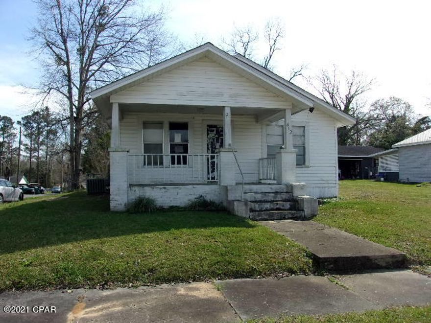 3 bedroom 1 bath Frame/vinyl home on corner lot in small town of Bonifay. Large living room. Nice size eat in country kitchen. Large laundry room. Covered front porch.  Covered back porch with storage areas. Mostly fenced back yard. No appliances. Nice and quiet paves street frontage. Being sold ''AS IS''.