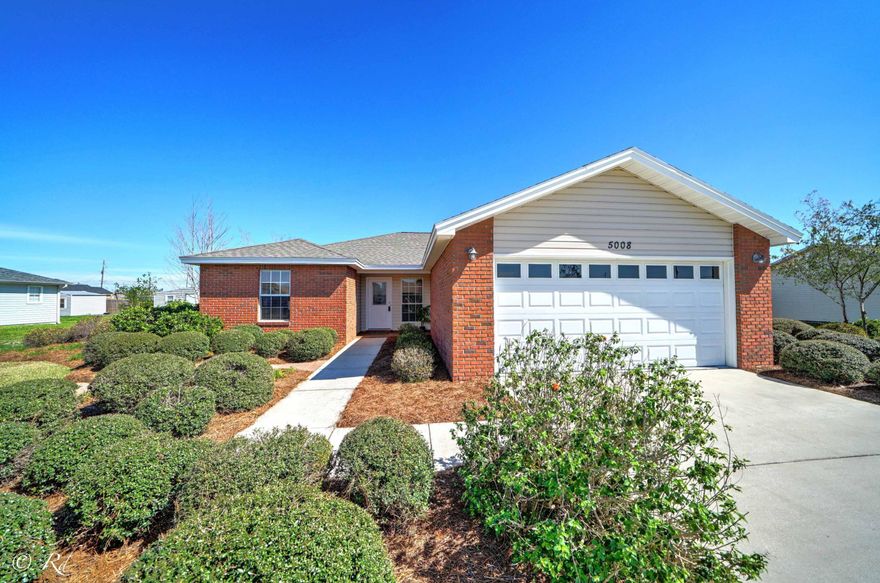 Move- in ready in Cherokee Heights. This 3/2 Split floorplan  home is within walking distance to Tommy Smith Elementary and Merritt Brown Middle School. As you enter the home, you will notice the open feeling with vaulted ceilings and a cozy fireplace.  It also features a larger master bathroom with dual vanities and walk-in closet. The galley style, eat-in kitchen has plenty of cabinet space along with a side-by-side refrigerator, smooth top stove, and convenient breakfast bar.  The exterior of the home is brick and vinyl for low maintenance.  The lot is extra large with a large patio.  Roof 2018, Hot water Heater 2018, New floors, fresh paint,  some new sheetrock and mostly new lighting.