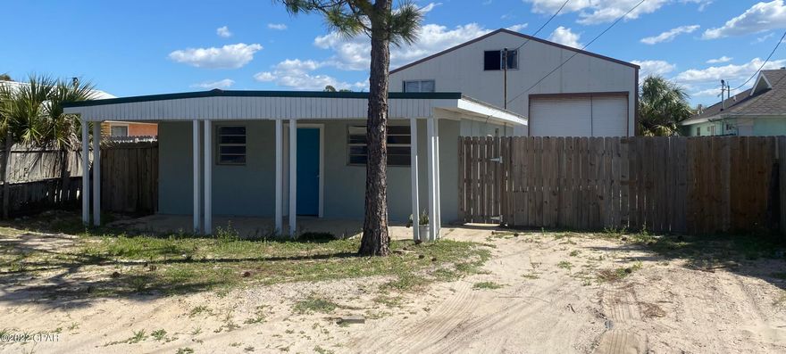 Looking for RV storage? Here's a cute, remodeled home just two blocks north of Thomas Drive with a 1,700 SF metal building in the back yard. Building has a large door to accommodate your RV easily, with plenty of room to spare for a workshop, auto garage, or boat storage. This 2 bedroom one bath home has all new appliances and floors. Previously rented for $1,200 a month.