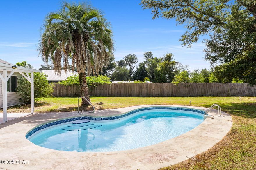 CURRENTLY UNDER CONTRACT, SELLER WILL CONSIDER BACKUP OFFERS Welcome to 541 Blue Heron Drive, where privacy, space, and lifestyle come together. Set on a half-acre lot with no HOA, this 3-bedroom, 2-bath home delivers the kind of freedom most buyers search for but seldom find. Step outside to your sparkling pool and deck, perfect for sun-filled afternoons, weekend cookouts, or evening retreats. A fully fenced yard adds both privacy and possibility, whether for gardens, hobbies, or simply open space to enjoy. 

Inside, skylights and thoughtful design bring natural light throughout the space. The layout strikes a balance between openness and privacy, while updated finishes in the kitchen and bathrooms add a touch of everyday style. The attached two-car garage offers secure parking and extra storage, a practical feature that makes daily living easy.

Conveniently located near Tyndall AFB, local parks, shopping, and dining, this home provides a seamless connection to what you need while offering a peaceful residential setting. This is an opportunity to claim your space, comfort, and outdoor lifestyle. Schedule your private showing today.