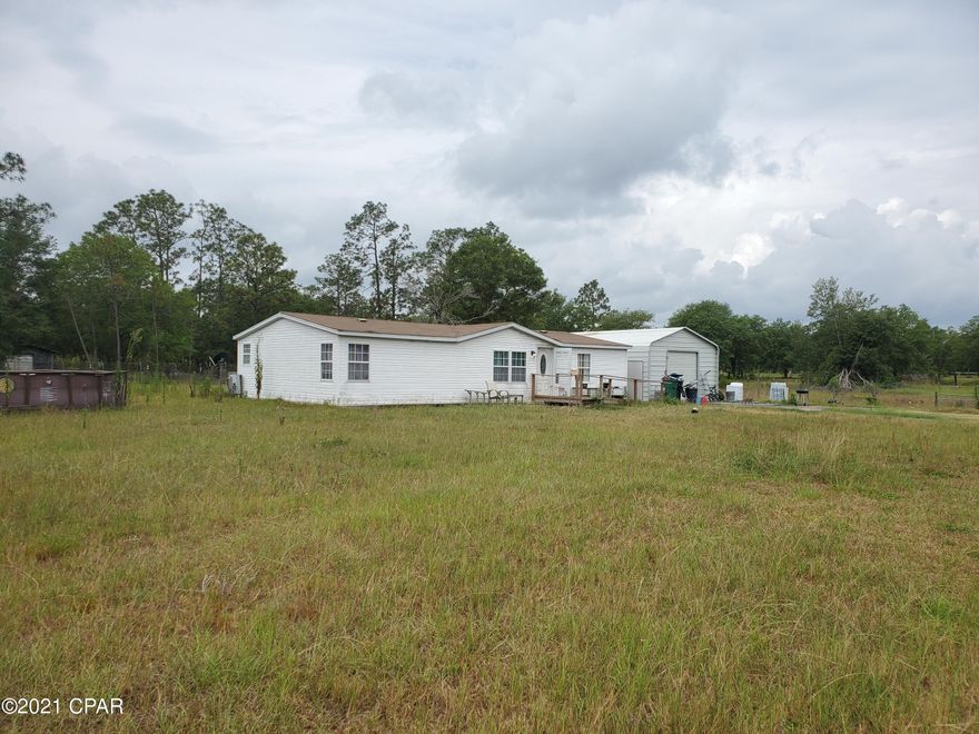UNDER CONTRACT TAKING BACKUPS Great piece of land, over 4 acres, yet easily accessible to Chipley going north or Lynn Haven, Panama City, or Panama City Beach going south. Northwest Florida Beaches International Airport is less than 30 minutes away. One car detached garage. Whole property is fenced with a few sectioned off parts. Horse barn! Home is in good shape; will need a little TLC to make it your own. Above ground pool can be gotten up and running for our steamy Florida summers! Don't forget the many area springs, lakes, & ponds for swimming & fishing! Just minutes from popular Boat Lake Recreation Swimming Park! Out of town owner expected to remove contents around 6/16/21. I can do a video walk-thru!