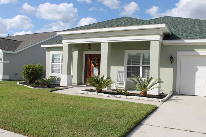 ***Currently under contract; Sellers accepting back up offers.*** Beautiful family home, located in the Hammocks subdivision which is golf cart friendly, has a community pool, side walks and street lights. This well maintained home is being sold by the original owner. It is a 4 bedroom, 2.5 bathroom with a split plan. It has been freshly painted inside and outside and   has a new vinyl fencing in the backyard. The new roof was installed in March 2019. This home features a two car garage, a covered front porch and a screened patio. Spacious breakfast nook, a formal dining room, a den and a living room with plenty of space. Recently installed second meter for lawn irrigation. Large master suite has two mirrored walk-in closets. Please come see it! You will not be disappointed.