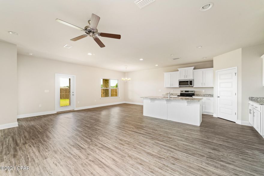 Welcome to Bridge Harbor! This is the Delray. As you enter, you will find elegant vinyl plank flooring in the foyer and all common areas of this home including wet areas. Just off the foyer is a hallway on the left with a linen closet, a hall bath and two bedrooms with plush carpet. To the right of the foyer is a laundry room and bedroom 4. The great room is open to the kitchen that features a center island and granite countertops. The kitchen also has a smooth top range, a microwave and dishwasher as well as a corner pantry and dining area. Just off the great room is bedroom 1 with walk-in closets and a bath that features double vanities with granite countertops and a large tiled shower. Bridge Harbor is located just minutes to shopping, dining and Tyndall AFB. A standard Smart Home package includes a KwikSet keyless entry, Skybell doorbell, automated front porch lighting, an Echo
Dot device, and Quolsys touch panel which can be integrated to control your lighting, thermostat, front door and so much more.
A builder 10 year structural warranty is also included.

Pictures, photographs, floor plans, elevations, features, colors and sizes are approximate for illustration purposes only and will vary from the homes as built. Home and community information including pricing, included features, terms, availability and amenities are subject to change and prior sale at any time without notice or obligation. For Move-In/Completion Estimates: Ready dates are estimates only. Timing of completion of construction and buyer move-in are subject to contingencies contained in home purchase agreement and governing jurisdictions issuance of a certificate of occupancy, and may change due to forces majeures and other delays or disruptions outside the reasonable control of the Builder.