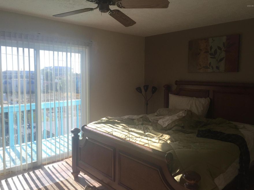 This spacious 2 bedroom, 2 bath townhouse is  located on the corner with the master bedroom facing the Gulf of Mexico . Enjoy the lovely views from your private balcony and large windows.   

The roof was replace 2/2014.