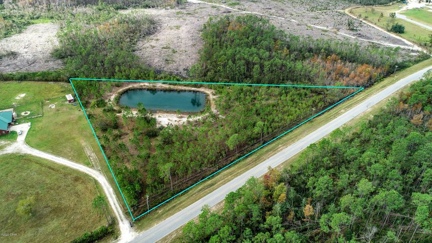 Just under 4 acres ready for you to build your own oasis! Private pond on property.