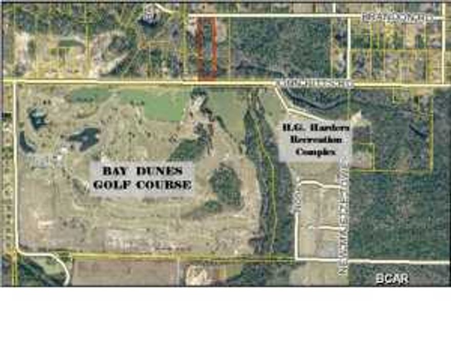 This 5 acre parcel is located in a great area! The 5 acres runs from Brandon Rd. through to John Pitts Rd. with Bayou George Creek running right across it. On the John Pitts side, the property is right across from the Bay Dunes Golf Course and just a block away from the H.G. Harder's Recreation Complex. There are wetlands on the property by the creek (priced accordingly), with the buildable upland portion being on the Brandon Rd. side of the creek. Bay County Utilities has indicated that public water is available here on the John Pitts side. The property is currently zoned R2, which allows for manufactured homes. This 5 acre parcel will be divided off of the larger 41.85 acre parcel, which consists of 2 non-connected pieces.