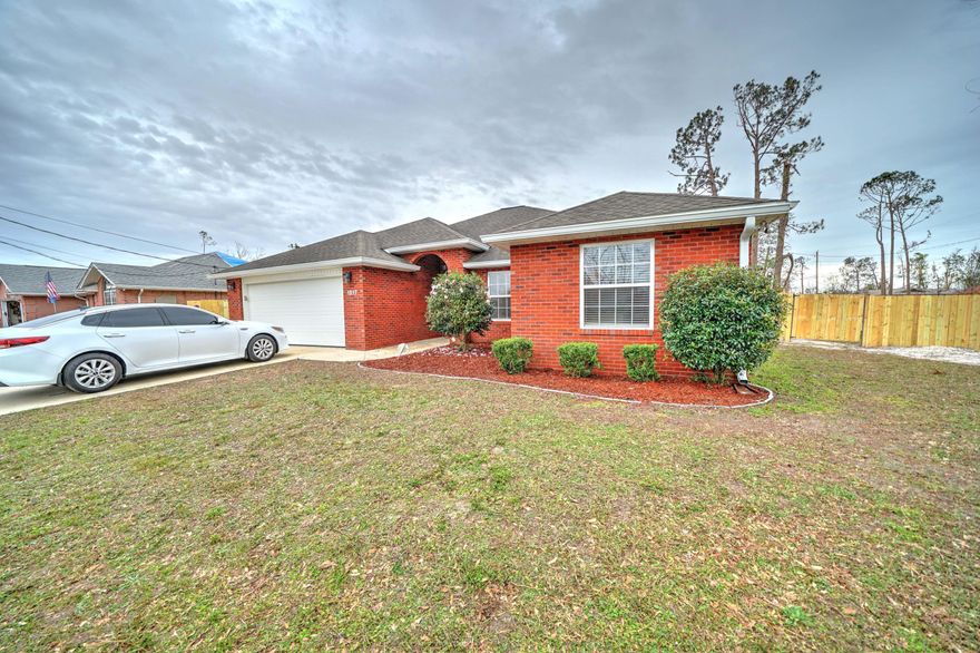 Great Location! Central to 23rd Street shopping, grocery, and dining. Close to Hathaway Bridge access to beaches, Pier Park and much more. Last home on a dead-end street. Interior includes: open great room, dining and kitchen area, wired for security system and surround sound, Electric fireplace with stone surround, hardwood floors in great room, hallway, and sunroom, tile floors in foyer, kitchen, laundry room, and bathrooms. Kitchen remodeled in 2014 and includes stainless appliances. Large master suite with His & Her closets (One of which is a walk in closet) Master Bathroom has just been updated with new floors and tile surrounding jetted garden tub, there's also a double vanity, and a separate shower. Additional 3 bedrooms and bath on the opposite side of the house. Sunroom at the back of the house overlooking the large backyard. The backyard includes a patio and wooden deck with plenty of room for a pool. 

Age, Square Footage, lot and room sizes approximate, if important please verify.