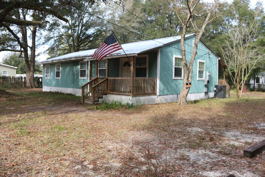 Back on the market due to buyers, home appraisal met value with no repairs. Enjoy country living on large lot (almost an acre) and still have the convenience of being near town. Plenty of space for kids, pets, boat or RV. The property has nice mature oak trees and offers plenty of shade. Home located near North Bay Haven School. New A/C in 2014 and new tin roof in 2015. New hot water heater Nov 2017.