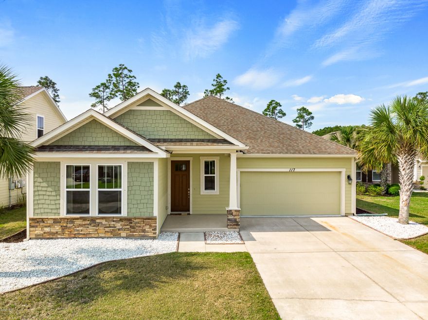NEW PAINT AND FLOORING, and located in one of the hottest communities in Panama City Beach. This spectacular Samuel Taylor built home is tucked away on a quiet street that backs up to woods and close enough to Breakfast Point Academy that the kids can walk to school and is the only K-8 school in Panama City Beach so no need to change schools from elementary to middle school.  The home has new Vinyl Plank flooring in all the bedrooms & closets.  With tile in the main areas. And, features a split bedroom floor plan with a large open kitchen/dining/living area. The back patio is perfect for relaxing all year. And plenty of backyard space for pets and children.  There is a large common area located just across the street for a little extra room for fun!  Come join the fun in Breakfast Point!