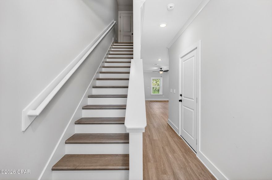 NO RENTAL RESTRICTIONS!!! Our stunning pool is NOW OPEN! The prefect place to SOAK UP THAT Florida SUN! Seagate at Clara is a new townhome community nestled in the vibrant city of Panama City Beach, FL. This two-story unit features board and batten exterior and covered entries. One car garage provides a great space for storing beach essentials. This open concept townhome boasts a stylish kitchen with white cabinets, tile backsplash, a large island with quartz counter tops - perfect for entertaining.  The elegant Owners Suite is designed with comfort in mind showcasing a large walk in closet and double- bowl vanities. Main Bath has tiled shower.  All bathrooms have quartz countertops.  LVP is located throughout the home.  The community pool features a cabana, lounging, seating and grilling stations. This community has a dedicated dog park. Seagate at Clara is in a prime location, approximately 1.4 miles to the sandy beaches and just minutes from Pier Park.