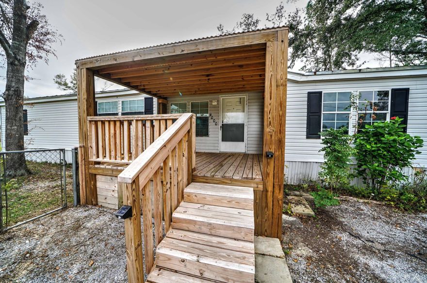 Large, energy efficient home on a large fenced lot! Enjoy quiet, country living in this move in ready home. The home has 3 beds/2 baths plus an extra room off the master that would be perfect for an office or nursery. The living area features a wood burning fireplace and a split floorplan. Outside there is a large workshop that is 12x24 with a 16x24 addition and an additional 8x8. Lots of storage and workspace. This home was built solid with 2x6 walls, engineered trusses and ceiling airducts. Not your typical manufactured  home. Solid metal roof added in 2013. New LVP flooring, new water pump, septic recently serviced, New front porch and all new fence.