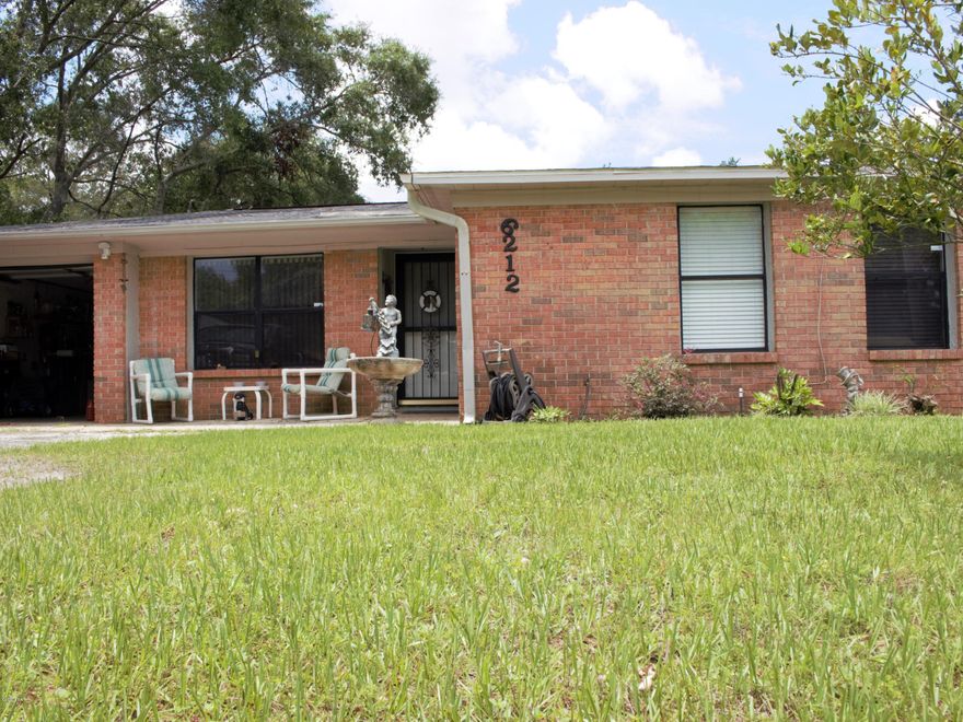 This is a Great Must See starter home! Living room, Kitchen, and bath rooms are all tile. 

New Carpet in bedrooms Kitchen has a lot of Cabinet space and has New Counter Tops, Refurnished Cabinets  New Vanities in bathrooms.  Large Screened Porch, Also Includes a nice size Shed in back with a carport. Large fenced in yard. Seller is offering a NEW ROOF to new home owners! What a great way to start in a New home.. Also comes with a One Year Warranty. Seller is Very Motivated!