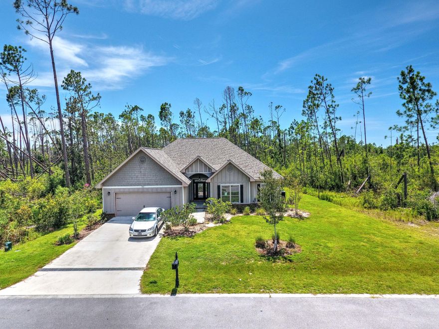 Currently under contract- Seller is accepting backup offers. You finally have the opportunity for a beautiful one level home with enough land and privacy to make you happy----AND it is  is priced at $299,500- 904 Tidewater Lane is in Laird Point, a gated neighborhood close to Eastern Shipyard and to Tyndall AFB. This 4 bedroom, 2.5 bath is a former ''model'' home and just what you need (as it looks brand new after the ''MICHAEL'' re-model.)  Start making memories in the ''Jamison'' plan with a 21 x 23 double garage and a 10 x 18 sun room.  No steps to climb, new roof, new flooring, new paint, new place! You will enjoy the country feel of this great subdivision and you definitely should see this ''gotta have it'' home for yourself--before it is too late!