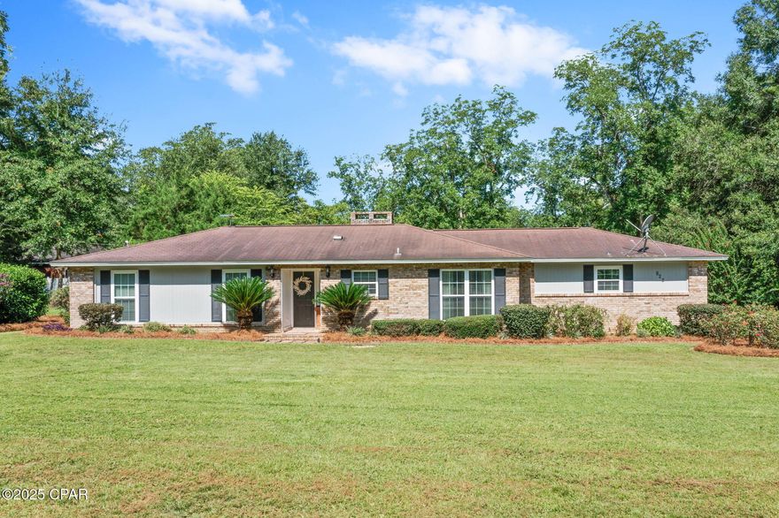 Welcome to this beautifully maintained 3 bedroom, 1.5 bath home in the heart of Chipley, offering stunning curb appeal and a rare 2.19± acre lot. From the moment you arrive, you'll be drawn in by the lush, landscaped yard and charming exterior. Inside, the home features an open concept living, dining, and kitchen area with beautiful vinyl plank flooring. The kitchen offers painted cabinetry, a convenient breakfast bar, and flows seamlessly into the spacious living room with a cozy wood-burning fireplace. A 12x14 Florida room provides the perfect space to relax or entertain year-round. The oversized laundry room includes a half bath and extra storage space. Outdoor living is just as impressive with an open patio ideal for grilling or gatherings, and an attached 2-vehicle carport for added convenience. Located just minutes from restaurants, shopping, and the hospital, this home offers the perfect blend of space, style, and location.