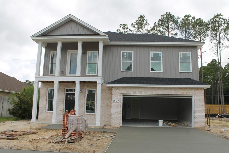 Beautiful new Construction in Lynn Haven by one of the areas most Prestigious builders. This home is loaded with extras, custom cabinets, upgraded lighting package wood looking tile floors granite kitchen tops custom colors all in one of the most desirable neighborhoods in the area. This home is all you need for your growing family contact your Realtor today to see this home.