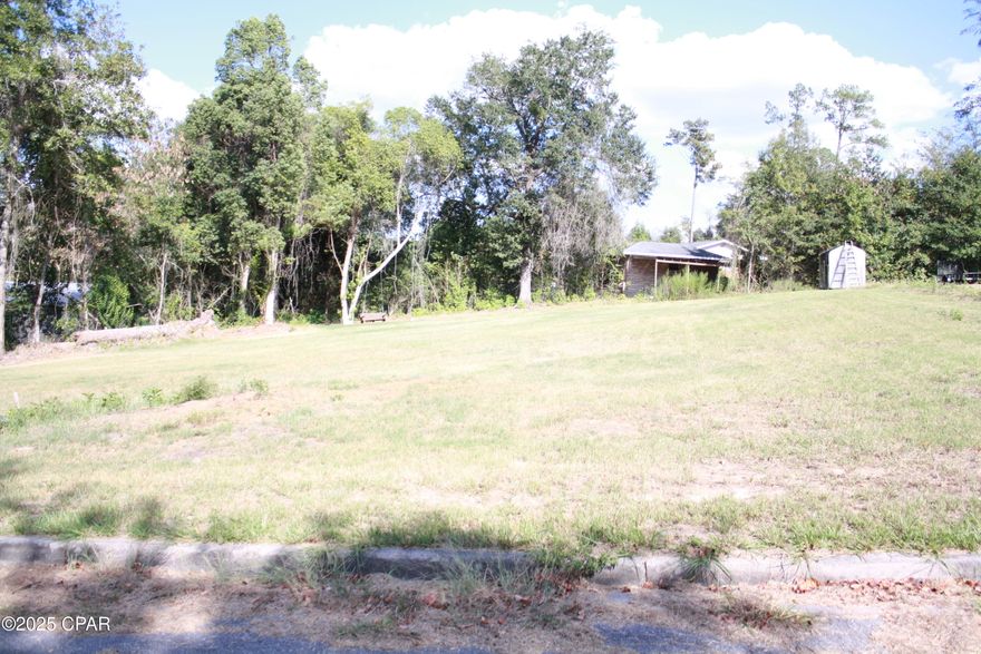 This is a site ready lot for your site built home or mobile home. It is cleared with water and sewer on site. Meter will need to be set and connected. The lot is located in an established neighborhood on a paved street. 

The zoning is R3 with multiple uses as determined by the City of Marianna.