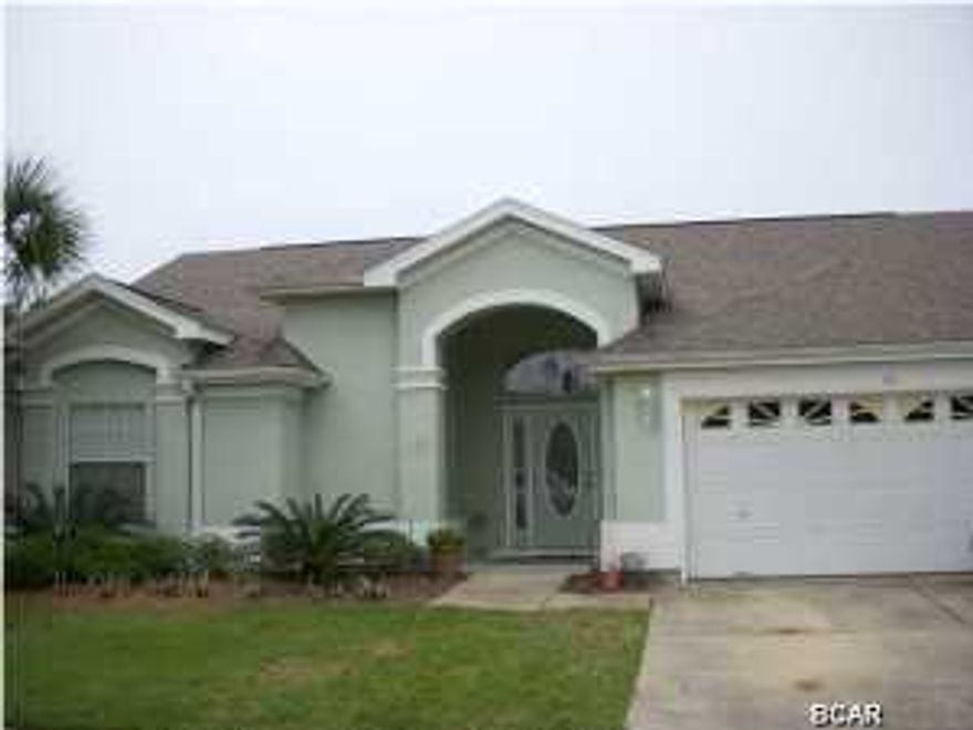 ~~~JUST REDUCED~~~Pride in ownership shows! Upgraded quartz kitchen counter tops, new stainless appliances, new AC unit. This home has an eat in kitchen, formal dining room and has a split bedroom plan. There are three bedrooms and an additional den. Privacy fenced back yard with a separate water meter for the lawn sprinkler system. The community has a pool and its only a short walk to the beach, Pier Park and Frank Brown park.