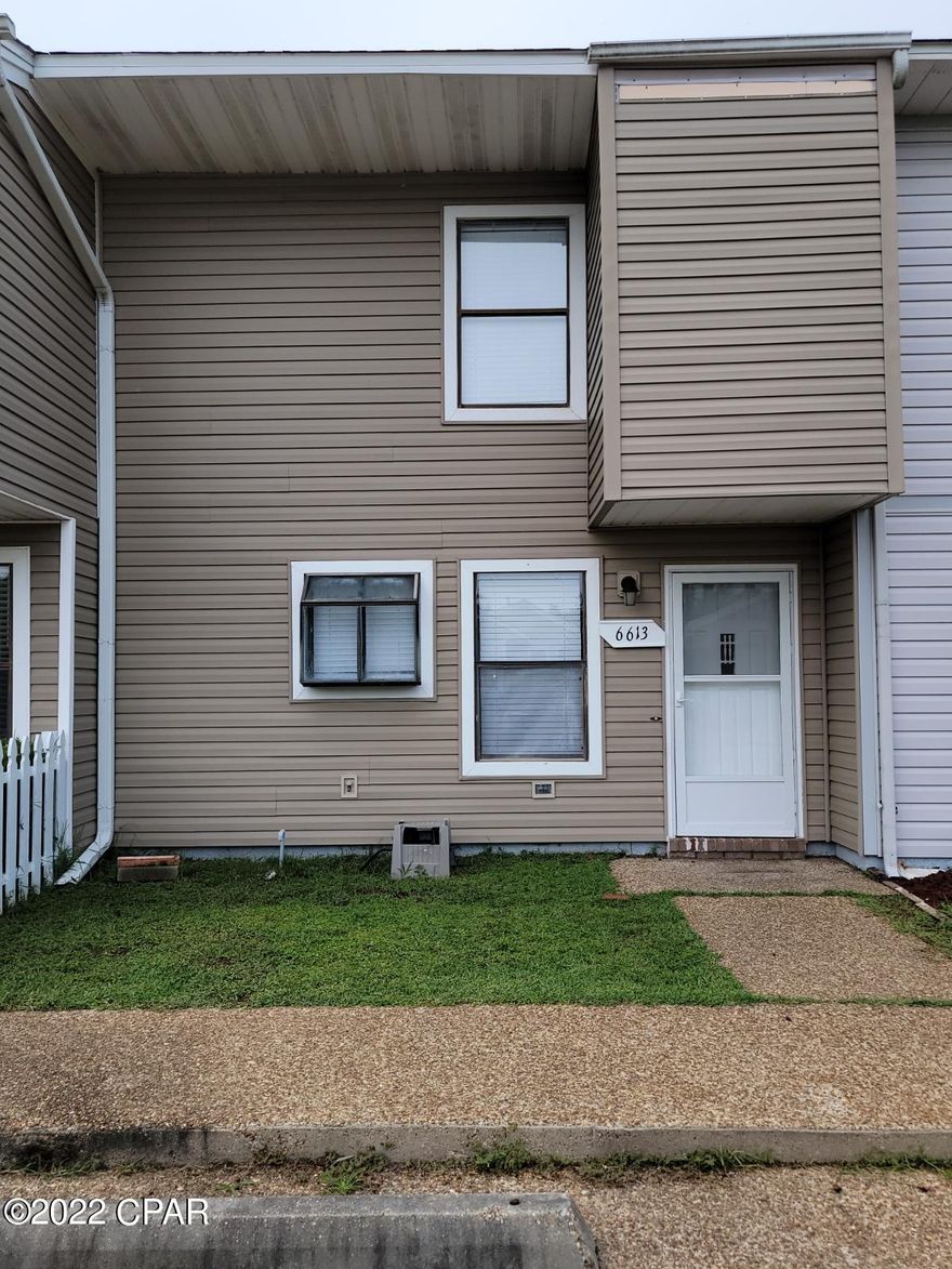 Coming available soon.- 2 bedroom. 1.5 bath townhome.  Equipped with refrigerator, range, dishwasher, and microwave. Washer & dryer connections.  Small privacy fenced backyard. Convenient to Tyndall Air Force Base as well as shopping, restaurants, and schools. NO PETS. Application Process includes Credit history & background check, Income  and/or job verification.