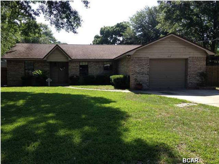 ''The pool is open!'' This move-in ready home with a split bedroom design can make your dreams come true. Conveniently located in the middle of Lynn Haven, this full brick home has 3 bedrooms, 2 baths with many updates and upgrades including a wonderful pool with plenty of concrete apron surrounding it for parties and outdoor furniture. The master bedroom suite includes a new bathroom makeover featuring a classy walk-in tile shower with glass doors. There is also a walk-in closet. The kitchen has a new tile backsplash with tinted glass, new double sink, dual wine racks, pantry, and features an island with a breakfast bar to accommodate the kids. The spacious living room has a vaulted ceiling with a new ceiling fan and is adjacent to a large, screened in back porch that overlooks the