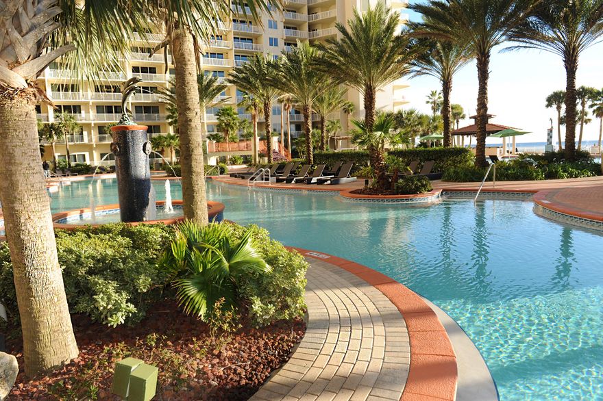 First floor beautifully furnished unit at Shores of Panama Resort with view of water and pool! Featuring 1 Bedroom and a Bunk Room, 2 Full Baths, Gulf Front Living Room, Master Bedroom with On Suite, 12ft Ceilings, Kitchen with granite countertops & breakfast bar. Shores of Panama, a 23 story condominium of gulf front luxury accommodations offering unparalleled amenities: 13,966 sq. ft. gulf side pool, Gulf side hot tub, Large heated indoor pool & hot tub, Covered on-site parking deck, Health center with fitness equipment, sauna, massage therapy and steam room, Two tiki bars serving lunch and dinner, Beach activities and rental services, Free high-speed internet access. Terrific rental place. Age, Square Footage, and room sizes approx, if important please verify.