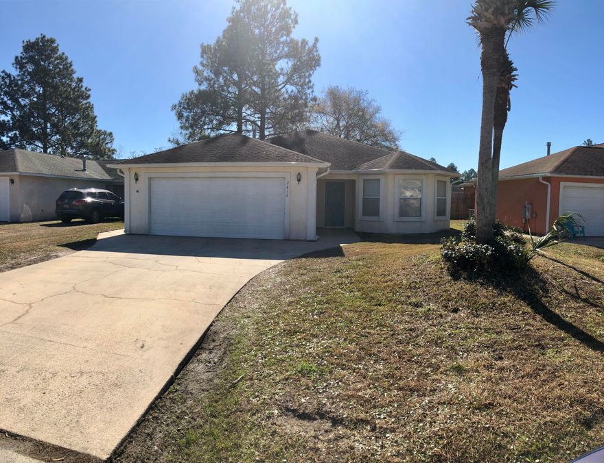 Are you looking for a nice home located in an established family neighborhood?  It is located close to Tyndall Air Force Base, businesses, shopping, schools, churches and near the center of town. It is also a short drive to the beaches and many other recreational opportunities. The home has a separate dining room with a nice convenience kitchen and high bar counter. All bedrooms are larger than standard and the master bedroom is not only spacious it has his and her walk in closets. The master bath has dual vanities and the more desired walk-in shower with seat. Even the full hall bathroom is larger than standard. An ample laundry room also offers access to the large double garage. The rear of the home has a nice covered porch, plumbed for a gas grill that has a privacy fenced back yard.
