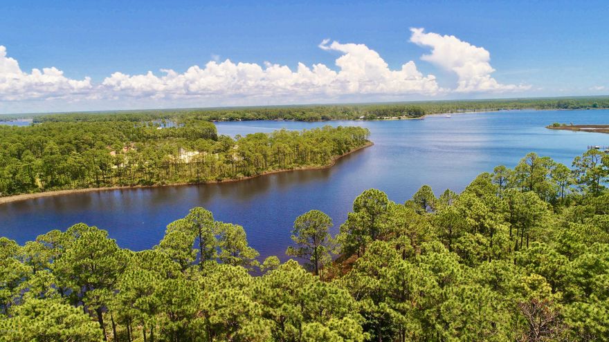 **JUST REDUCED**DRONE VIDEO under Pictures. DEEP WATER, TRUE DOCKABLE, WATERFRONT LOT IN LAIRD POINT Located in a CUL-DE-SAC for added privacy!!! Lot 46 has 78 feet of water frontage and is one of only 35 lots in the subdivision which are ''Dockable''  lots. Laird Point has direct access to the intracoastal waterway and the Gulf of Mexico with stunning views of East Bay and Cooks Bayou. If you have not been to Laird Point recently it's worth planning a trip. The community is gated for added privacy and features double tennis courts. This community is located in a private setting, yet minutes from shopping, area restaurants, Tyndall Air force base, 22 miles to St. Andrew State Park in Panama City Beach, and 29 miles to Northwest Florida Beaches Intl Airport. If you (ENTER ON ''MORE' have ever dreamed of owning a waterfront home where you can take your boat at your leisure, fish, watch the dolphins, or just sit peacefully taking in nature, you will not want to miss this opportunity.  Please see uploaded survey for exact dimensions.  Seller will turn over survey to buyer.  If this sounds like the waterfront lot you have been waiting for call today for a private showing!