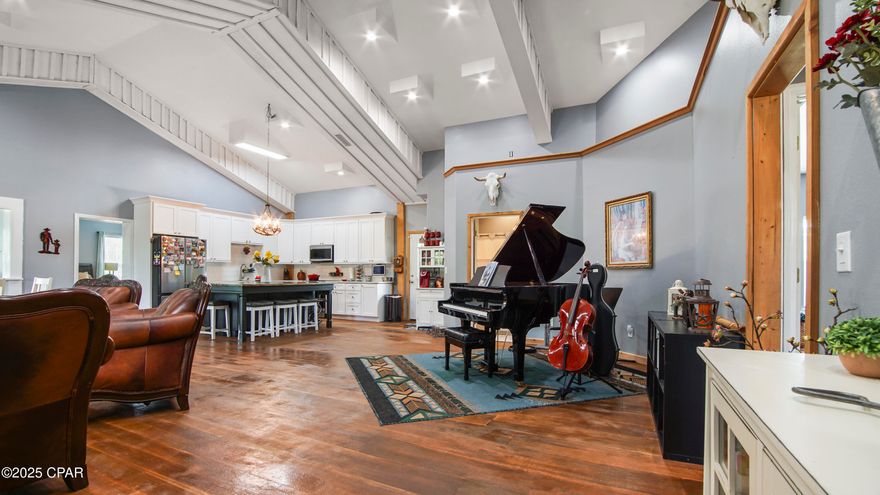 At just over 19 acres, this home site is surrounded by natural beauty with plenty of privacy. With 3150 square feet, this 4 bedroom, 3 bath open floor plan home provides a spacious family room and kitchen perfect for entertaining. The master bedroom includes 2 large walk-in closets and a spacious master bath that leads directly out to the back porch. The floor in the majority of the home is epoxy that looks and feels like real wood! The kitchen was completely redone in 2023. It boasts an island with a showpiece of quartzite and the other counters are also quartzite.  Appliances are less than two years old and most are SMART appliances that connect to Wi-Fi. Metal roof replaced in 2018. There is a 32x60 pole barn that is ready for you to design however you wish. The property has two separate pastures for horses or cattle! There is only a 40-minute drive to Panama City, less than one hour to Mexico Beach or Tallahassee and only 30 minutes to Marianna. This must-see country home has a great set up in place. Call today to schedule a private tour. 
*Measurements are approximate. Please verify if important.