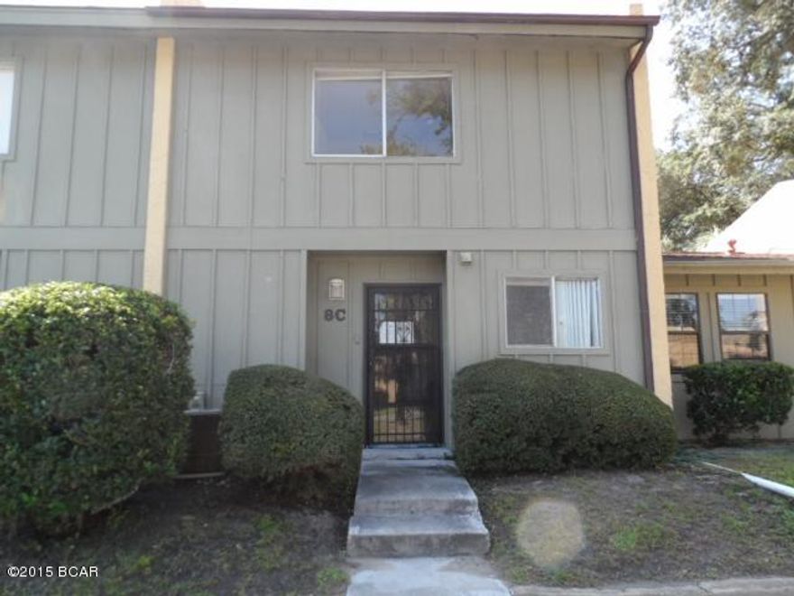 Interior townhome has so much potential.  Main floor features a separate kitchen, dining area, living room, and pretty courtyard in the back fully privacy fenced.  Upstairs you'll find 2 spacious bedrooms.  Update and you'll have a real charmer. Amenities galore!  Enjoy the Panama City Mall, Publix, Home Depot, Best Buy, Sam's Club, Walmart, and TONS of other amenities literally blocks from your front door!EQUAL HOUSING OPPORTUNITY