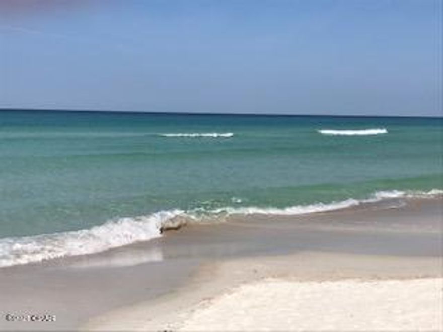 CURRENTLY UNDER CONTRACT, SELLER ACCEPTING BACKUP OFFERS

GULF FRONT 3/3 condo at Sugar Beach! 2 story condo with Master and LR balconies Gulf front to sit out and enjoy the view. Open floorplan downstairs and split floorplan upstairs. Good amount of storage. 

Sugar Beach is centrally located and has dedicated beach access. The community has a pool, BBQ area, walking paths, pond, tennis and shuffle board courts, and community room. Pet Friendly. Park in front of your condo. No waiting for elevators. Condo has been recently updated with new appliances,  bathrooms remodeled, hand painted concrete floors upstairs and on stairs. Additional updates done throughout. This would make a great home or investment. Used minimally as a vacation rental.