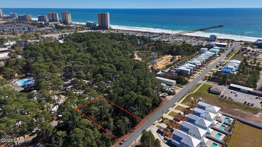 Only 500 yards from the white sandy beaches of Panama City Beach. Take a short walk and your toes will be in the sand as you overlook the Gulf of America and the World's most Beautiful Beaches. This vacant parcel is your ticket to building your coastal dream home. Centrally located close to all of the best attractions that PCB has to offer. This parcel has the possibility to be used for Residential or commercial uses with CH Commercial Zoning. 

Conveniently located between Front Beach and Middle Beach Road, you'll have quick access to dining, attractions and the beaches while benefitting from the convenience of multiple routes to avoid heavy traffic when necessary. Build a second home, primary home or a vacation rental.