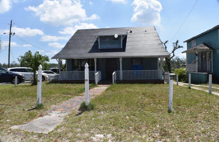 Fantastic development opportunities with this large property on Massalina Bayou!  Great location for this building in Historical Downtown Panama City.  Overlooking a deepwater bayou, this was once an attorney's office and it's conveniently next to the Bay County Courthouse.  The main building is a two-story with many offices, built-ins  and even a walk-out basement!  The second building is a quadplex which would make a rental investment.  The bayou is deep water, ample depth for sailboats, trawlers, etc... You can put several docks there or one huge one!  There is a drawbridge for tall vessels and masts so you can easily motor out into St Andrews Bay and the Gulf of Mexico.  Properties are being sold AS-IS.  All info is approx. and must be verified by Buyers if important. This property is part of the downtown zoning district, the most inclusive district within the city.  It allows the largest mixture of land uses within the City's regulations - allowing residential with commercial, entertainment and industrial uses.  This district is located within the Downtown Community Redevelopment Area (CRA) and it is likely the CRA Board will be involved in determining approval for most projects.