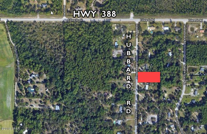 ***Mobile Home Ready ***  ready lot Deep lot with mobile home zoning. Lot was cleared after the hurricane. Electric service pole in place. Electrical meter is missing.  The lot also has a private well and septic tank but no pump. 

The portable storage shed is not included. Owner financing available w/$5,000 down payment. Contact agent for details.