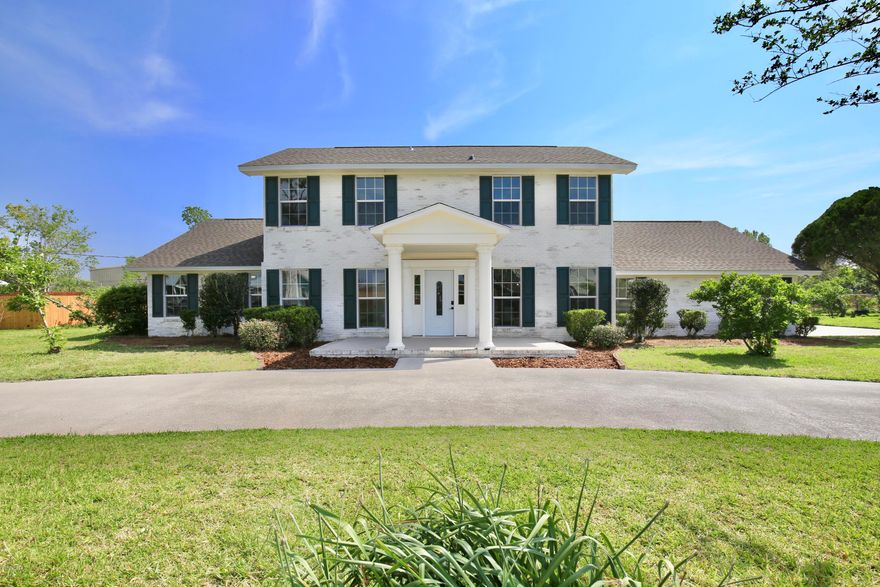 Welcome home! Take your boat out fishing on the bay, spend the day at Panama City Beach, explore Shipwreck Island and Wonderworks amusement parks, browse the shopping & dining at Panama City Square, and observe the animals at Zooworld. You'll be located off US Hwy 98 just 2 miles from the Pretty Bayou boat ramp and 8 miles from the beach. This completely renovated colonial style home features landscaping and accent lighting with multiple colors, a repaved circle driveway, side entry two car garage, 2 storage sheds, a carport to park your boat/four wheelers, and a spacious backyard with a water fountain. Inside you'll be greeted by the beautifully remodeledstaircase, wood laminate floors, neutral colors and rustic finishes. The luxurious kitchen features white cabinets, backsplash, stainless steel appliances, granite countertops and a dining space illuminated by a farmhouse chandelier. The mudroom provides a bench to change out of your work boots and storage for your mail & keys. The open family room presents vaulted ceilings with beams, a stone fireplace, built in storage, and oversized windows 
allowing natural light. The spacious downstairs master has a huge 
walk in closet, dual vanities with waterfall faucets, a beautifully remodeled shower, a Bluetooth speaker for playing music and a soothing blue light. Upstairs you'll find 2 bedrooms sharing a Jack and Jill bath. To see this captivating estate for sale, view the 
3D virtual tour and contact us today!