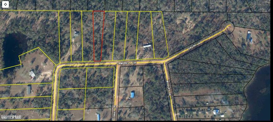 Peaceful one acre lot near Lake Susan in The Highland of Compass Lake.  Wooded and would make a nice place to build or put in a mobile home.