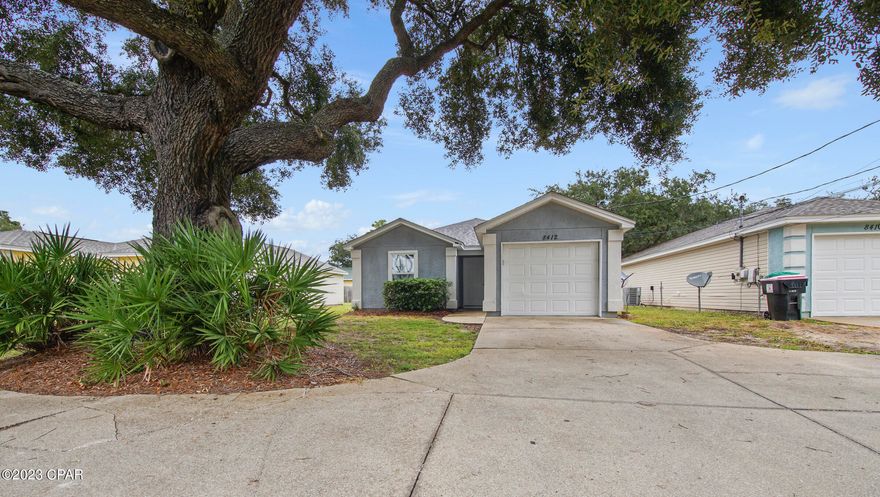 This three bedroom two bath home with a one car garage is conveniently located to dining, shopping and schools on the east end of Panama City Beach.   Featuring a split floorplan with updated lighting, fixtures and flooring.  The yard is not fenced and cannot be fenced.