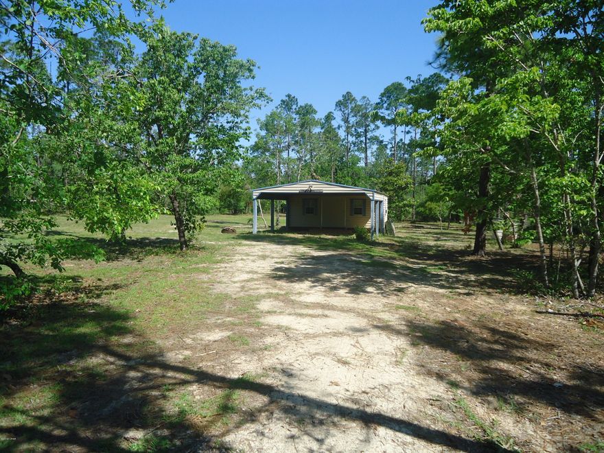 This is a  lovely cleared residential lot with a water view of pristine Silver Lake.  The lot has a 16 x 20 metal storage building with an attached 20 x 20 carport.  There is another storage building that measures 8 x 13.  the property has an  80 ft. well. There is a 30 amp pole for RV hook up. The Property owners have access to the lake at the landowner's public area that is approximately 1 mile from this location.  No gas engines allowed.