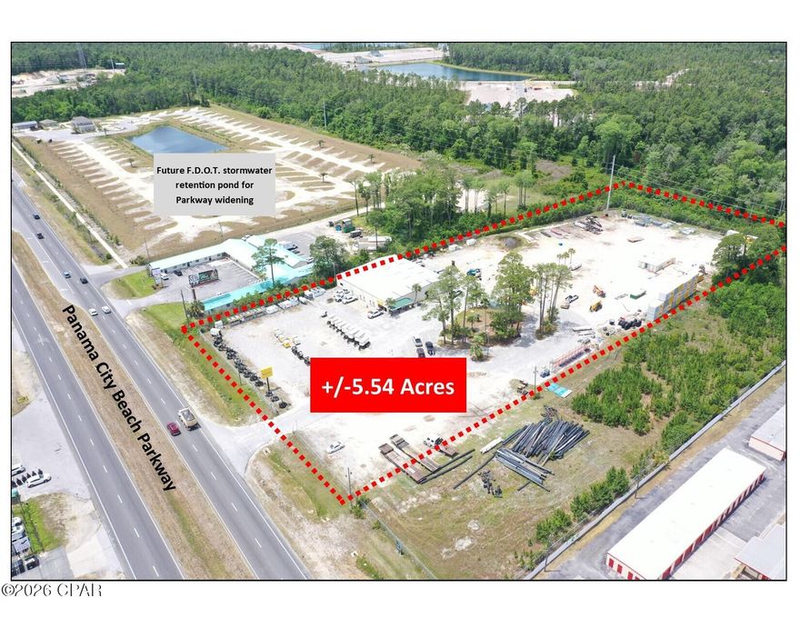 Exceptional commercial development site located on highly traveled Panama City Beach Parkway in the center of the fastest-growing corridors in Panama City Beach.

This high-visibility parcel is zoned GC-3 General Commercial within unincorporated Bay County.  The property includes approximately 345 feet of frontage on Panama City Beach Parkway with 700 feet of depth. The annual average daily traffic count is estimated at an impressive 44,500 vehicles. 

The property provides outstanding flexibility for retail, mixed-use, hospitality/hotel, multi-family, medical, automotive, restaurant, self-storage, office, or large-scale commercial development opportunities.

Strategically positioned near the rapidly expanding Publix Sports Park corridor on Chip Seal Parkway, the property benefits from substantial ongoing residential, recreational, and infrastructure growth throughout the surrounding area. The sports complex features championship-caliber soccer and multi-purpose athletic fields that attract year-round regional and national tournaments, generating significant visitor traffic and economic impact for the area. The site is also located near the new A. Gary Walsingham Academy Elementary School and continuing residential expansion surrounding the Breakfast Point and Chip Seal Parkway developments, creating strong long-term demand drivers for commercial services, retail, restaurants, medical users, and neighborhood-oriented businesses.

Additional area growth is being fueled by ongoing roadway and infrastructure improvements, including the expansion and connectivity plans surrounding Philip Griffitts Parkway and Chip Seal Parkway, designed to improve traffic flow and accessibility throughout Panama City Beach.

The property also includes a large building with 9,180 square feet of space. The building includes approximately 5,000 square feet of warehouse, four--12' x 14' roll up doors, 14' clear ceiling height, and 4,000 square feet of office-showroom.  The property is currently leased by HERC Rental with the lease expiring on May 31, 2027.

Property Highlights

• Approximately 345' of Panama City 
   Beach Parkway frontage 
• Excellent visibility and accessibility
• AADT 44,500 
• Minutes from beaches, schools, sports facilities, and major residential growth
• Located within a rapidly expanding commercial corridor
• Ideal for hospitality, mixed-use, medical, automotive sales, or investment development

With continued explosive growth throughout the east end of Panama City Beach and limited remaining commercial frontage opportunities along this corridor, this property represents a premier long-term investment and development opportunity.