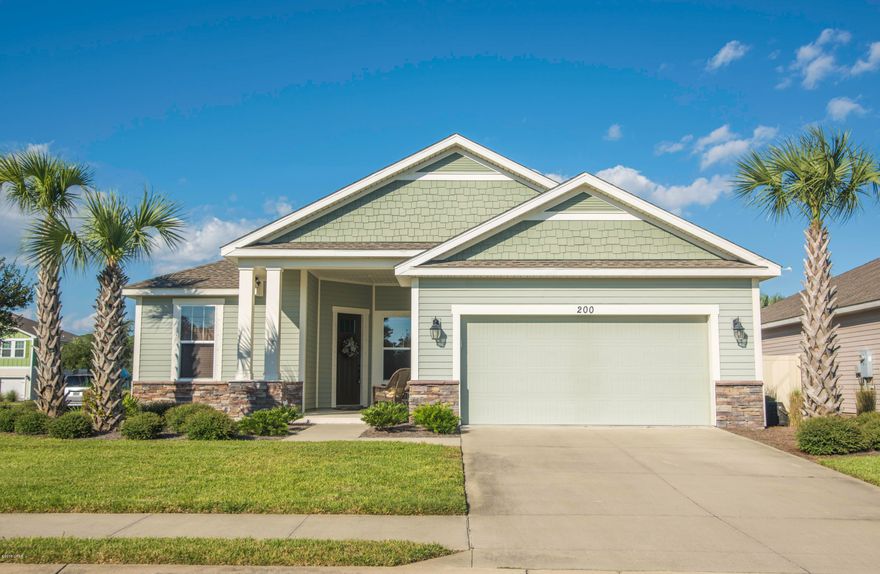 This beautiful home located on the highly desirable West end of the beach will take your breath away!As you walk in you will immediately notice the amazing wood floors through out the main living areas.The open floor plan boasts a large kitchen with granite counter-tops,upgraded stainless steel appliances,plenty of cabinet and counter space.There are two family rooms,a large dining area,and beautiful french doors(in living room and Master)leading to an over sized,screened in patio.Have a large family or need room for guests? It's not a problem in this house!The four nice size bedrooms,main bathroom, and a half bath for company will sure to please.Love spending time outside? This home has a massive screened in patio!Outside the patio is a gazebo for relaxing. Only a few min. to the beach!