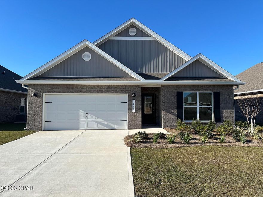 Andrews Park is centrally located off 389 in the very desirable area off Lynn Haven. Our Rhett floorplan is all brick, 4-bedroom 2-bath, it is an open concept floor plan, with a boasting 1,835 sq.ft. The Rhett floorplan has upgraded finishes throughout. You will find 9-foot ceilings with 10-foot trays and beautiful crown molding. The Rhett also has LVP flooring, granite countertops, a large kitchen island with cabinetry on both sides underneath and brushed nickel hardware. This floorplan has energy efficient windows to allow lots of beautiful natural light. The primary bathroom has a beautiful garden tub, perfect for relaxing, and a spacious walk-in shower with a glass enclosure.