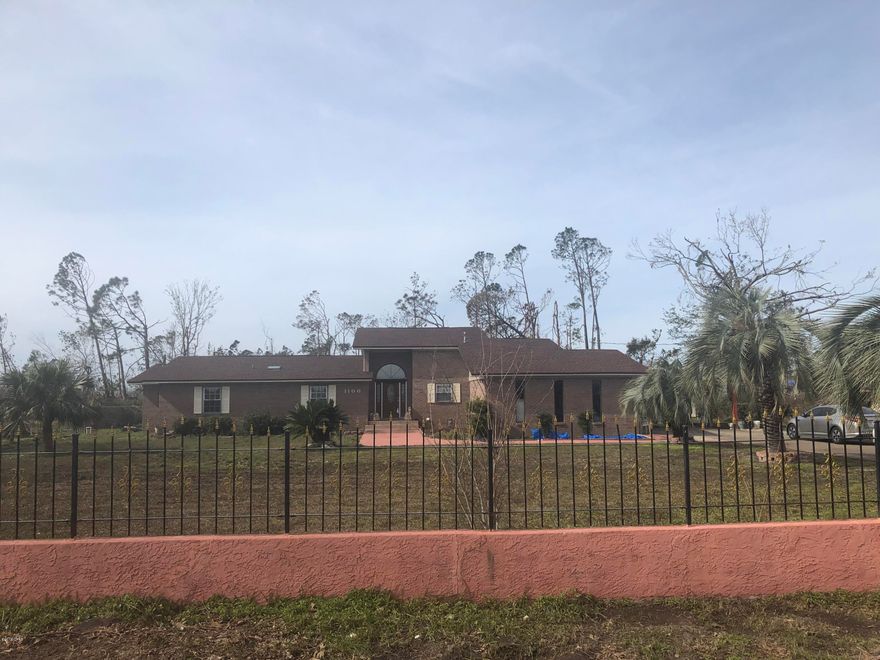 *** Don't miss out on this 2,903 Sq. Ft. home located on one acre in Panama City.  Home features a new kitchen with soft close cabinets, granite countertops, double ovens, stainless steel appliances, new roof, air condition unit with 10 year warranty, tile throughout main areas of home, carpet in bedrooms and living and dining area, 3 bedroom, 2.5 baths, large master suite  with his and her walk-in closets, two wells for landscaping and fruit trees, two storage and work sheds, new chain link fence around back yard.