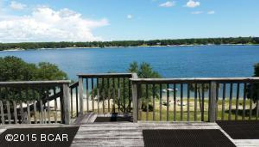 New on the Market! A rare opportunity for a lakefront home on Crystal Lake. The Open concept floor plan is great for entertaining. Stunning lake views from the Living Room, Dining Room, and Kitchen. Glass doors open to the deck offering plenty of room for family and friends. Stairs from the deck lead almost all the way to the lake for added conveinence. Very spacious master suite offers double vanity and seperate tub and shower. Both guest rooms are of nice size. This home feels much larger than square footage listed. This home has been very well maintained and pride of ownership shows throughout. Crystal lake is home to the clearest waters and sandiest shores of any lake in the area. It is the place to be. If you are looking for a lakefront home, you owe it to yourself to visit this one.