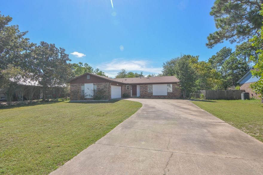 PRICE REDUCED!! SELLER SAYS MOVE IT!!Great home close to Tyndall AFB. The living area is open to the dining area and kitchen. All of these rooms can enjoy the nice wood burning fireplace. Home has a 2 car garage for parking and garage is totally insulated. Large deck in backyard for entertaining. Nice quiet area of Callaway.