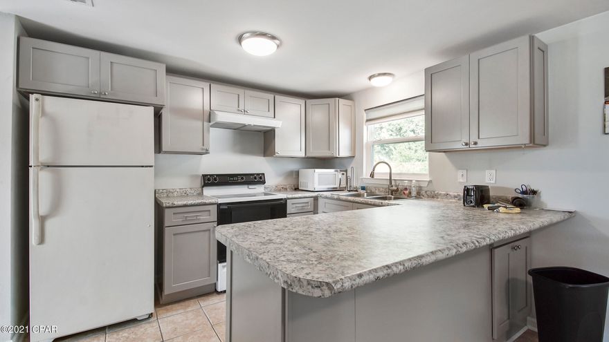 Rare find in today's market! 4 bedrooms for under $200K! This home has been remodeled and features a new roof, new windows,  flooring, cabinets, paint and more post Hurricane Michael. Conveniently located on a quiet street close to Tyndall Air Force Base it would make a great home for a relocating family or rental. Located near shops and dining this one will not to last long.