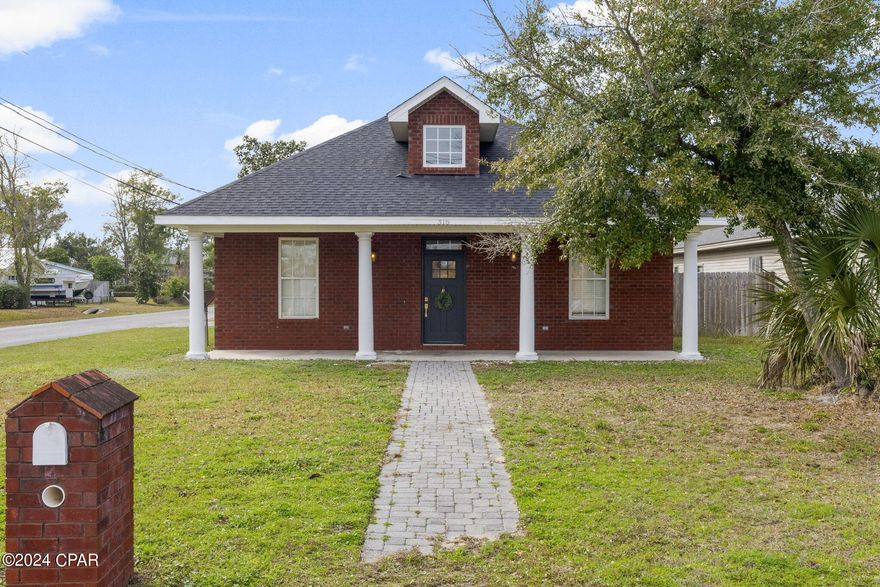 'CURRENTLY UNDER CONTRACT, SELLER WILL CONSIDER BACKUP OFFERS' Recently Owner remodeled to perfection! Like New & Move in ready All-Brick Lynn Haven Home! Excellent Location Only 1 Block from Lynn Haven Boat Ramp, Park & 2 local restaurants. Home Located high & dry in flood Zone X. This home has all the Extras: Spacious & Split bedroom Open Floorplan, High Ceilings, Fully Remodeled kitchen (2023) with Custom Solid Wood Cabinets, Quartz Counter Tops, custom backsplash & all new stainless steel appliances that convey with sale! The Dining Area is spacious & there is a storage closet in close proximity to kitchen& dining area which would make a wonderful extra large pantry! The home also has brand new Luxury Vinyl Plank Flooring & New Paint throughout Interior! The upgrades continue with Elegant Crown Molding & Tray Ceilings in Master Bedroom and Living Room. The large Master Bedroom offers enough space to host a king size bedding set comfortably with plenty of room & a spacious Master Bathroom with Tiled Shower, Whirlpool Tub Surrounded by Granite and Tile, Separate Sinks with great storage & much more! The home has a nice sized laundry room & an over sized fully insulated & finished out 2 car garage with Insulated garage door & back door with easy access to the backyard from the garage. The Exterior is sure to impress- The Corner lot offers great access to the fully Privacy Fenced Backyard which boasts a relaxing brick paver outdoor space & outdoor kitchen area! The home has had many updates to include new roof 2019, appliances only 1 year old & HVAC only 4 months old to name a few! Make your appointment to view today! ***Timeframes & Measurements Approximate Please verify if needed***