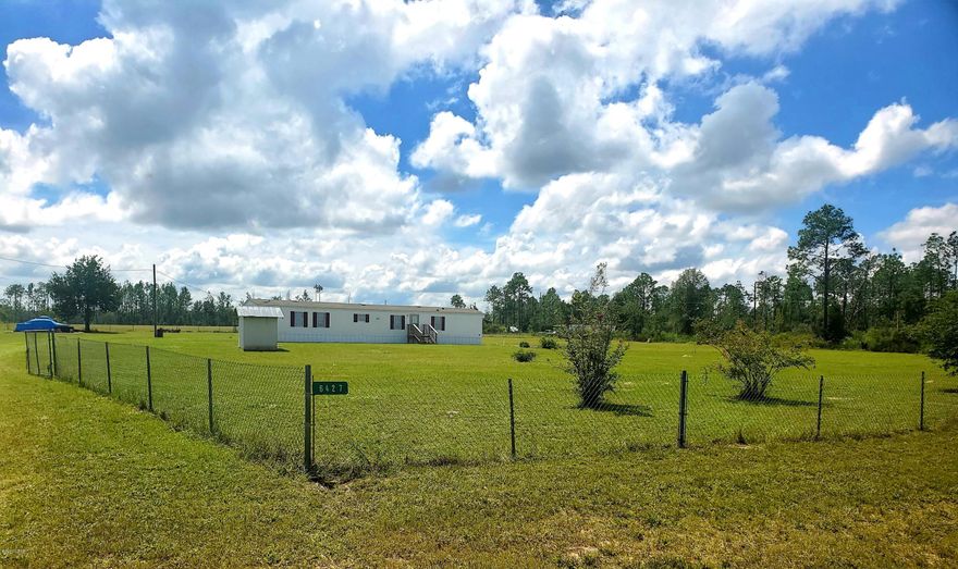 Looking to get out of the city or just looking for peace and quiet out in the country? Come check out this peaceful country living,  3 acres of fenced in yard and  3\4 fenced  7 acres pasture of  luscious Bahia grass. Ready for your horses or cows or to grow your own food. 45 mins from Panama City,  Dothan Al and Tallahassee. Comes with a spacious 3\2 mobile home completely renovated,  and not lived in since renovations. With new floors,  trim , bathrooms , all led lights and brand new 3 and a half ton complete  AC system.  Property comes ready to move into and has plenty of slab foundations to erect your barn up on including 12x16 slab, 32x50 and 24x60 . The 76x16 mobile home has a 11x15 master Br, with a 9x4 walk in closet with bathroom access, 11x9 Br, and 9x15 Br both with 2x3 closet