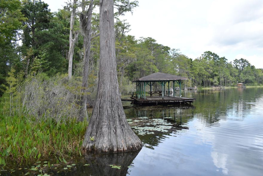 Build your next dream home with a WATERFRONT VIEW on beautiful Dunford Lake.  This lake offers the perfect setting for peace and quiet in the gated community of Paradise Lakes.  If you are a fisherman, you will definitely enjoy fishing on this cypress-spring fed lake which is well known for large bass and is one of the largest lakes in Washington County.  This lot is conveniently located near the boat ramp and has paved road frontage.  Call today to schedule a showing with your favorite agent!