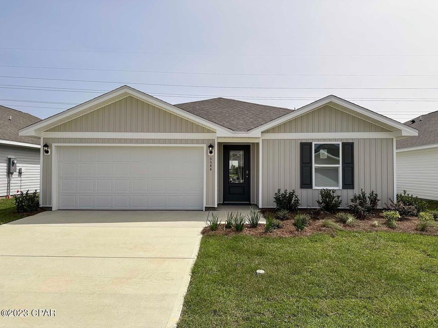 When you enter the Freeport floorplan through the prairie door you will notice immediately the brightness of the entry hallway. This 4 bedroom 2 bath, 1387 square foot, home is an open floorplan with two bedrooms separated by a full bathroom at the front of the home and one bedroom across the entry hallway affording family and friends alike privacy when visiting. The large kitchen island overlooks the dining room and living room allowing all to be together or doing individual tasks in each area. The main areas of the home as well as the bathrooms and laundry have beautiful luxury vinyl plank while the bedrooms offer plush carpeting. The spacious primary bedroom leads to the bathroom featuring a large shower, single vanity, and a large closet.

Liberty neighborhood is conveniently located in beautiful Panama City off Star Avenue near 231. Located just 25 minutes from Tyndall Airforce Base, 20 minutes to hospitals, and less than 15 minutes to shopping, restaurants, and grocery stores you will be amazed at the convenience once you enter the winding entrance to this beautiful sanctuary. Liberty, D.R. Horton's premier new lifestyle community, offers a 7,500 square foot community center with full gym, wellness rooms and much more. Additionally, behind the community center is a water wonderland with resort style pool, splash pads, and an outdoor grilling kitchen with seating.